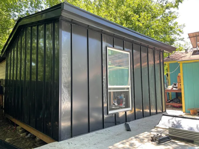 Black standing seam metal wall panels for Roof Inspection in Perryville